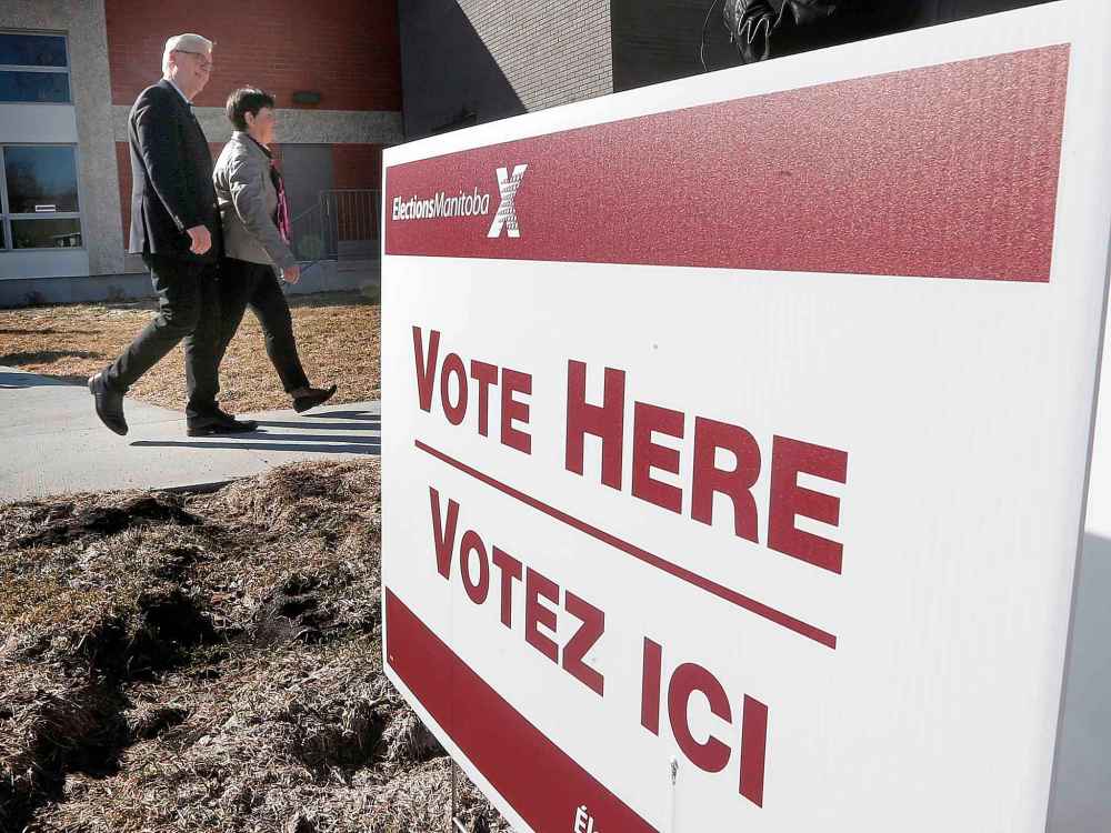 John Woods / THE CANADIAN PRESS FILES
Then-NDP leader Greg Selinger and his wife vote in the April 2016 election that would sink his party.