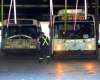 BORIS MINKEVICH / WINNIPEG FREE PRESS
General Winnipeg Transit garage photos taken at 421 Osborne St. In this photo a worker walks in front of a bus in the garage.