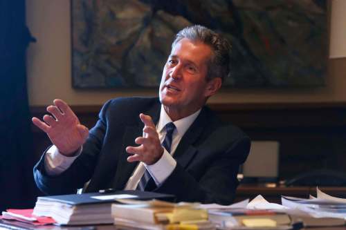 WAYNE GLOWACKI / WINNIPEG FREE PRESS
Premier Brian Pallister in his office Friday with a sample of the reading material he took to Costa Rica.