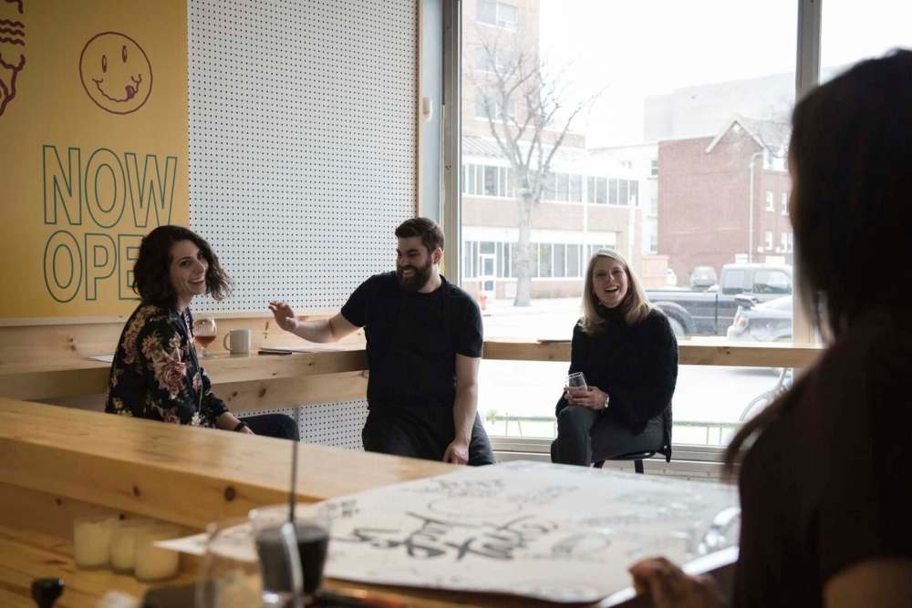 Danielle Loeb, Max Frank and Maureen Krauss share ideas at Have a Nice Day Eats.