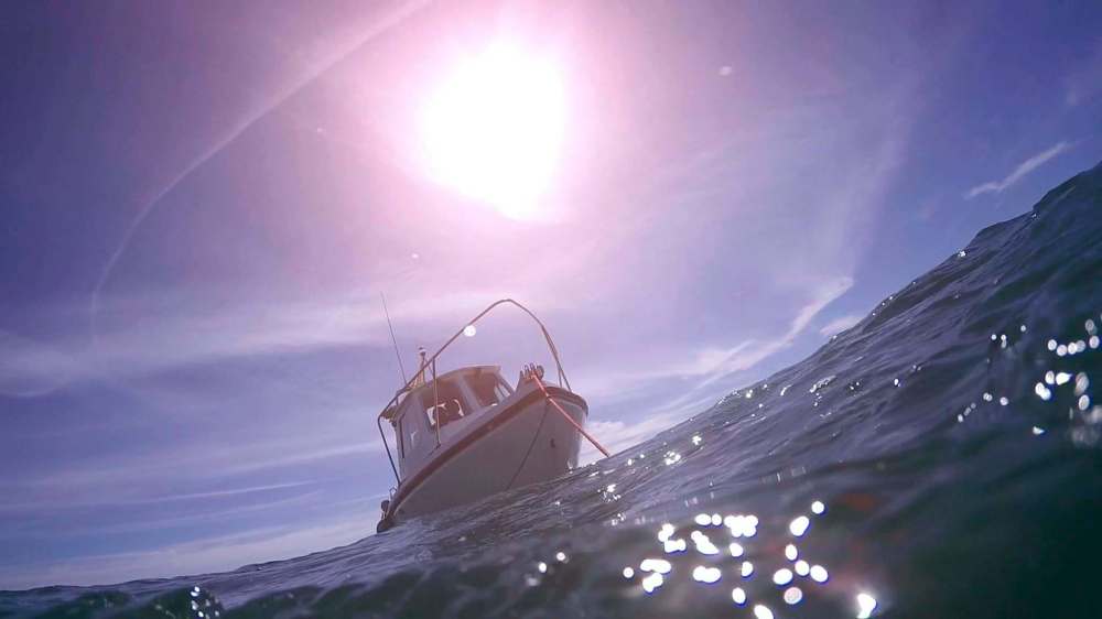Looking back at dive boat before going under