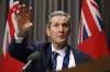 Premier Brian Pallister announced plans for a curling centre of excellence that will help train future curlers. (John Woods / Canadian Press files)