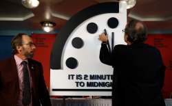 Carolyn Kaster / The Associated Press
Robert Rosner (right), chairman of the Bulletin of the Atomic Scientists, joined by Bulletin member Lawrence Krauss, moves the Doomsday Clock to two minutes to midnight.
