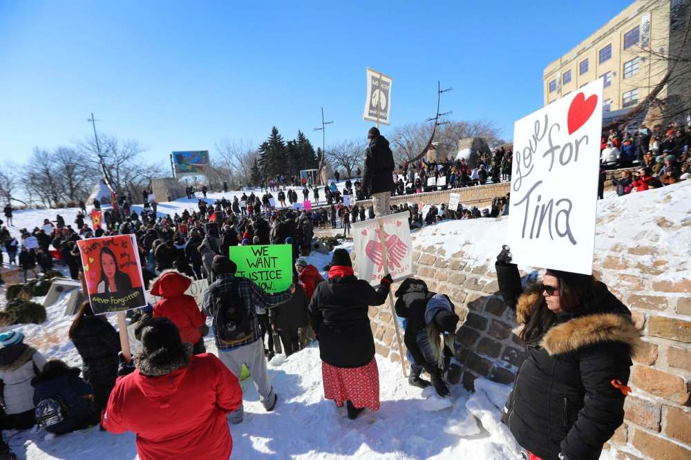 RUTH BONNEVILLE / WINNIPEG FREE PRESS
Hundreds of people marched from the Law Courts to the The Forks holding signs in support of Tina Fontaine's family members after a not guilty verdict was issued to Tina's accused killer, Raymond Cormier.