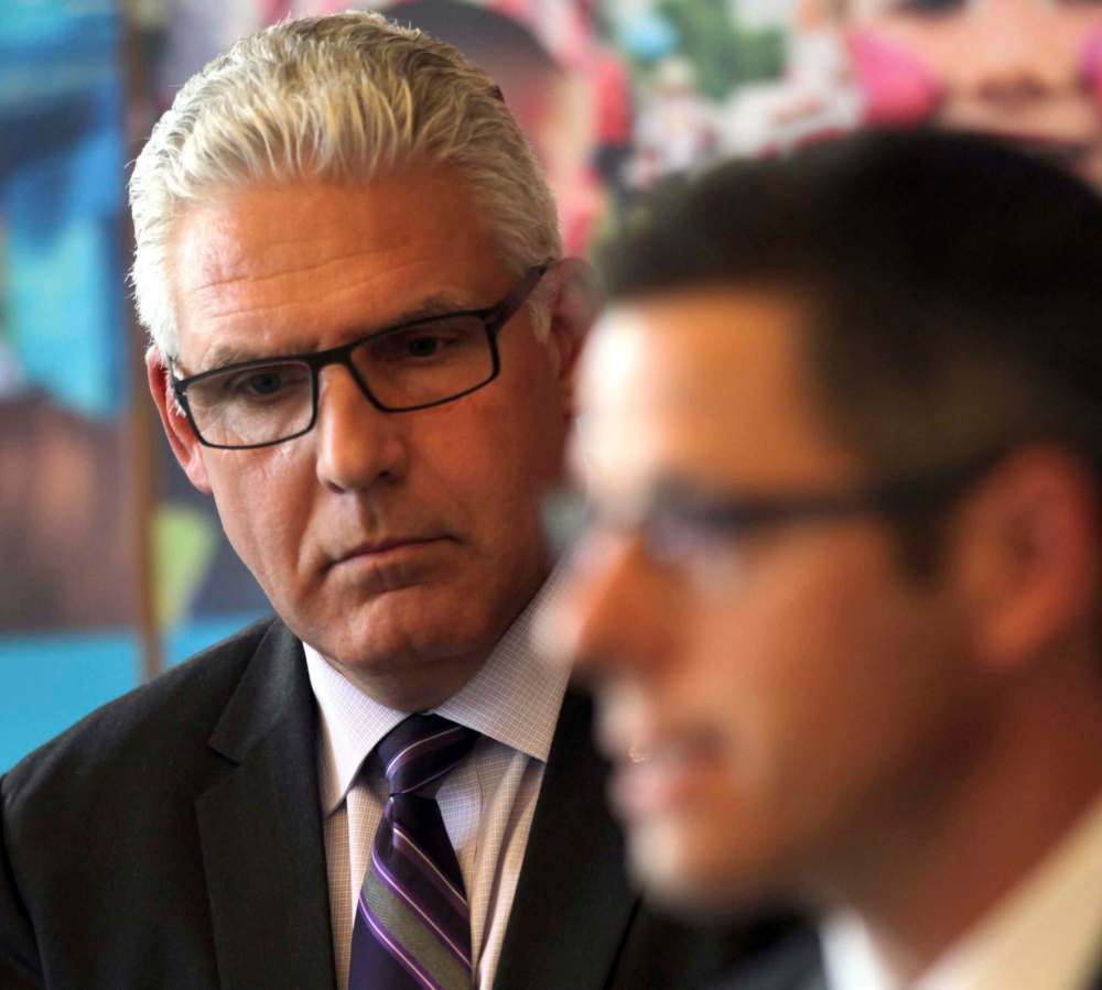 Phil Hossack / Winnipeg Free Press Files
City of Winnipeg CAO Doug McNeil, seen with Mayor Brian Bowman, wants to ‘get everybody in the same room’ to talk about the building.