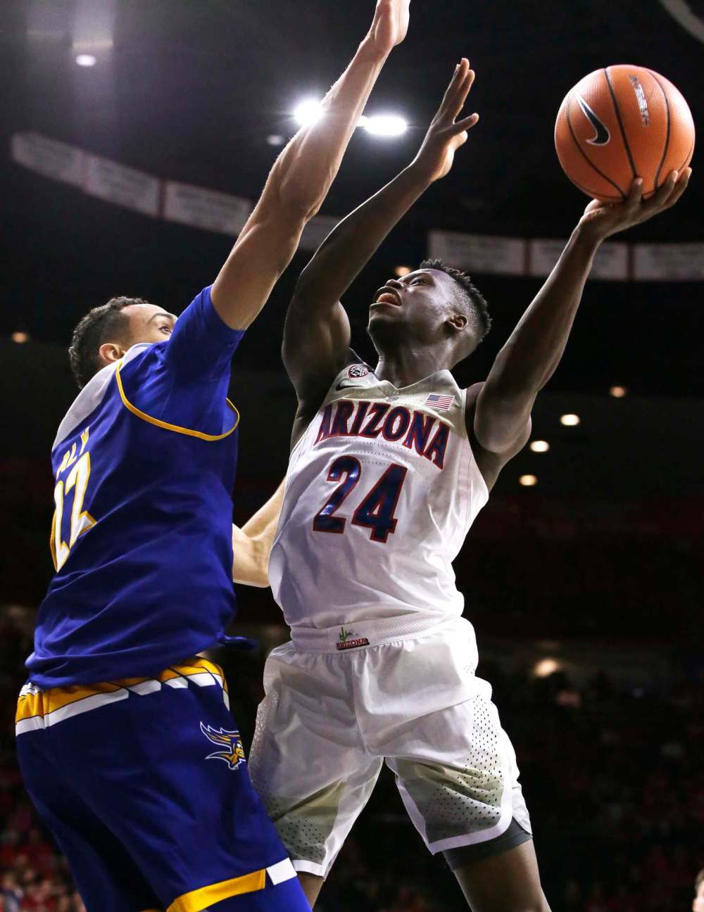 Emmanuel Akot (right) looks for a shot against Cal State Bakersfield centre Moataz Aly. (Rick Scuteri / The Associated Press Files)