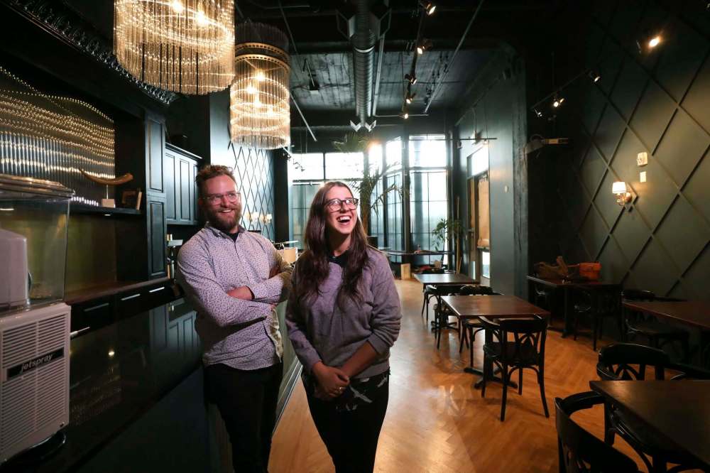 Grey Owl Coffee & Pub owner Bryan Goertz and manager Jess Preachuk on the main floor of the Scott Block. (Ruth Bonneville photos / Winnipeg Free Press)