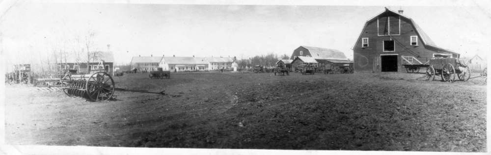 Manitoba Historical Society
In 1918 when the Hutterite immigrated to Manitoba, these barns in the Huron Colony in Bernard, Man., were converted to family dwellings until the housing units were finished.