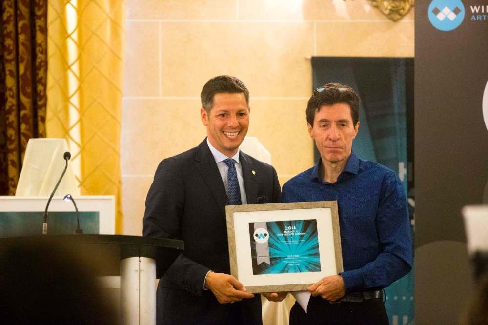 Mayor Brian Bowman and Making a Difference Award winner Keith Oliver, president of the Manitoba Craft Council. (MIKAELA MACKENZIE / WINNIPEG FREE PRESS)