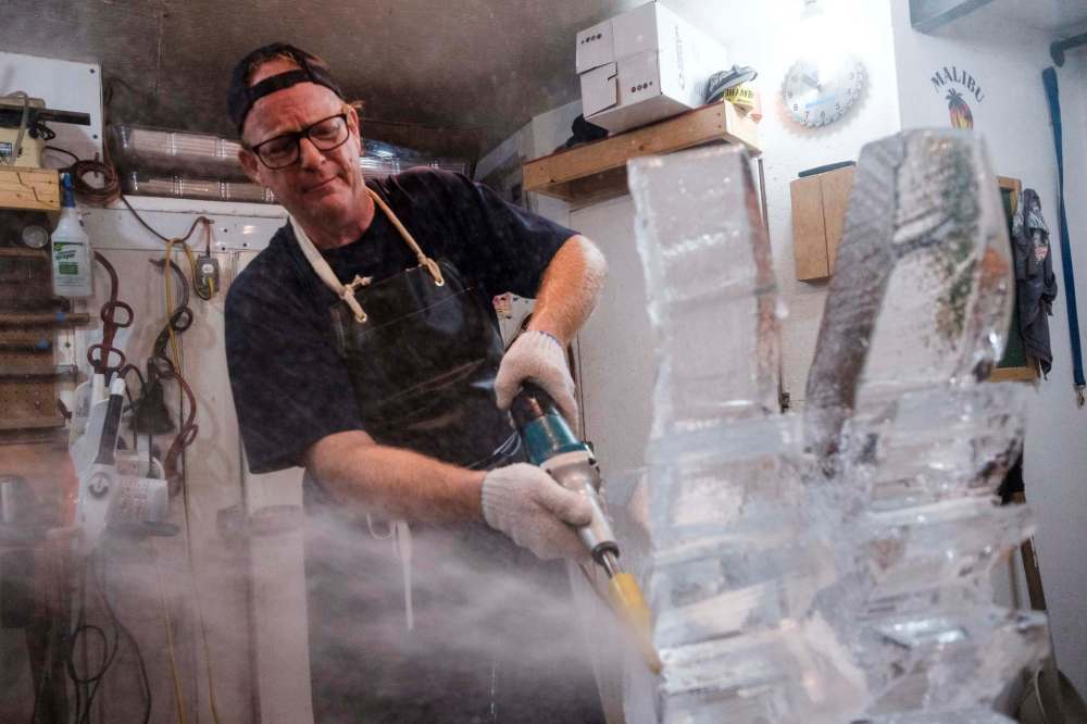 The ice blocks are chipped down to about 300 pounds by the time Wade is finished.