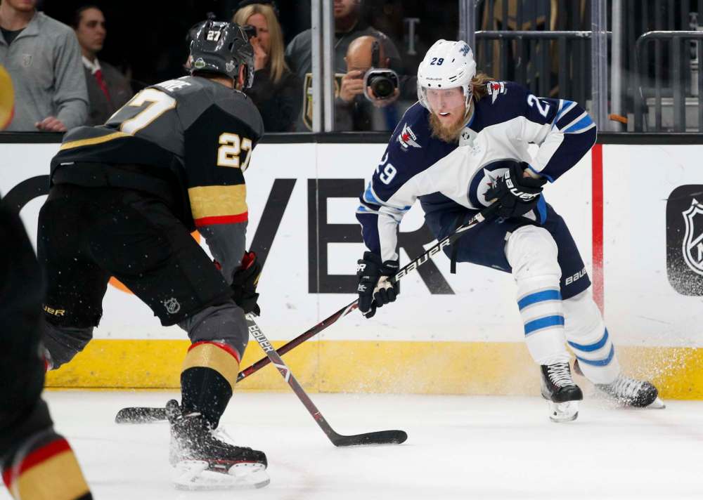 Sniper Patrik Laine will be in line for a big raise next season. (John Locher / The Associated Press)