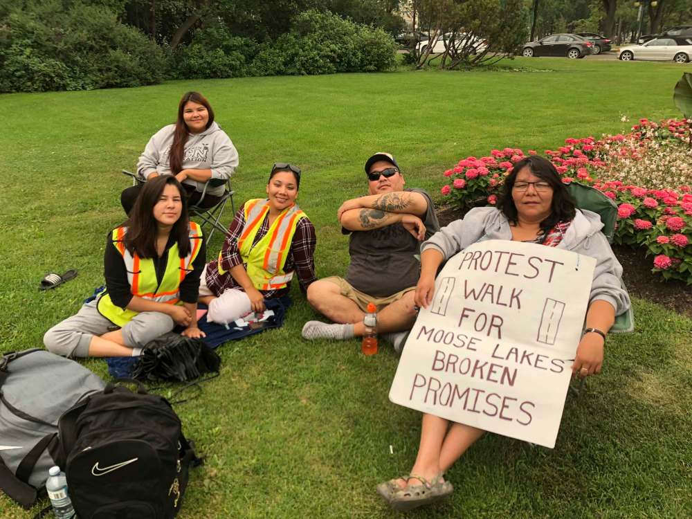 On Thursday, about 100 people protested an unmet provincial promise to pave a 65-kilometre stretch of gravel road into their northern community. (Niigaan Sinclair / Free Press files)