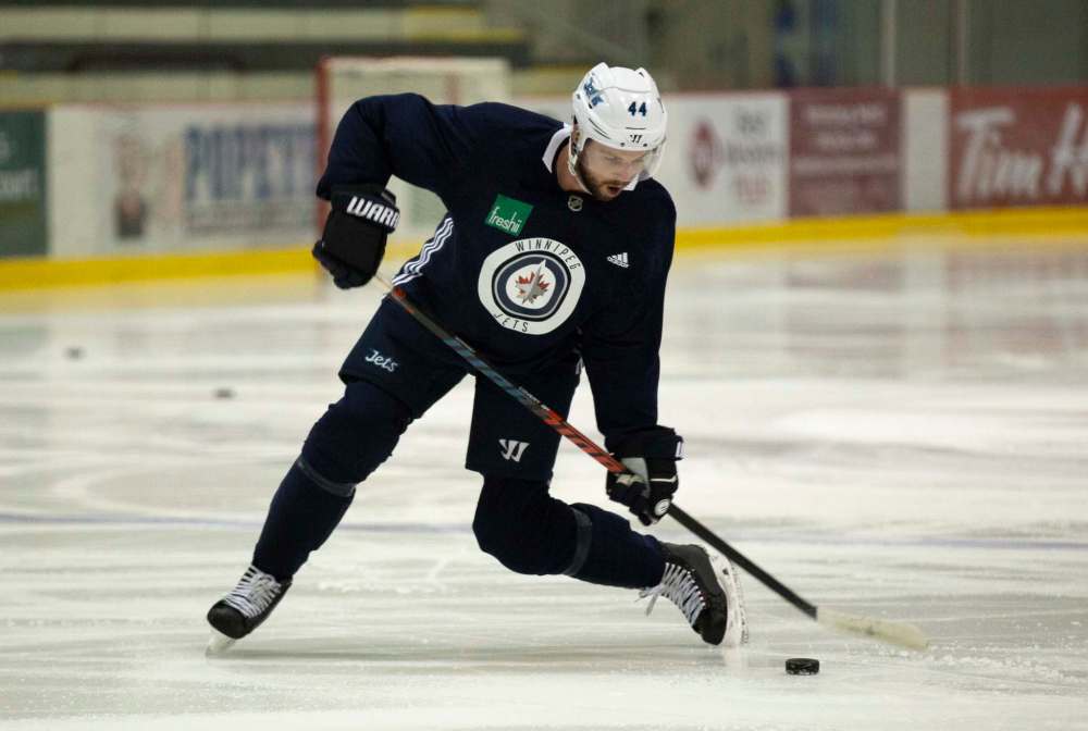 Josh Morrissey worked on his one-timers Tuesday, receiving passes from teammate Mark Scheifele. (Andrew Ryan / Winnipeg Free Press)