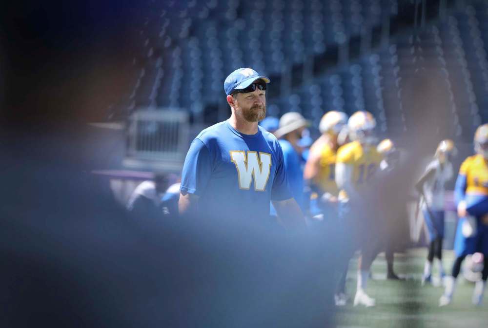 Head coach Mike O'Shea's job wasn't to nourish his quarterback's warrior mentality by putting him back into the game Friday, it was to protect his quarterback, both physically and mentally. (Ruth Bonneville / Winnipeg Free Press)