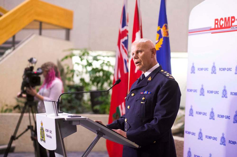 Assistant Commissioner Scott Kolody speaks to the media regarding the shooting of an officer and the search for the suspects near Onanole. (Mikaela MacKenzie / Winnipeg Free Press)