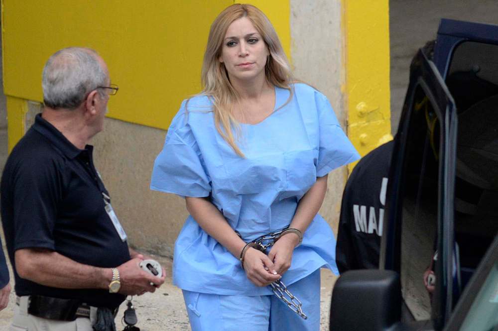 Carlos Giusti/El Vocero via AP
Aurea Vazquz-Rijos, above in a 2015 file photo, is accused of hiring a hit man to kill her husband Canadian Adam Anhang on Sept. 22, 2005.