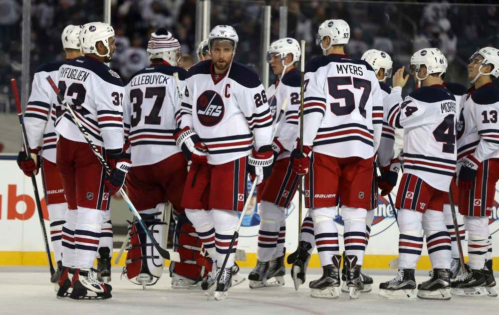 The Heritage Classic jersey, released in 2016 for the Heritage Classic game against the Edmonton Oilers, is the most popular Jets jersey at River City Sports on St. James Street. (Trevor Hagan / The Canadian Press files)
