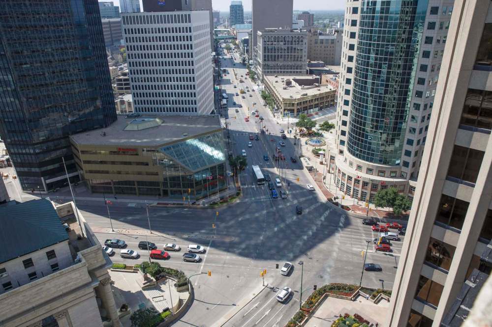 MIKE DEAL / WINNIPEG FREE PRESS FILES
The intersection of Portage Avenue and Main Street as seen from the roof of the Fairmont Hotel.