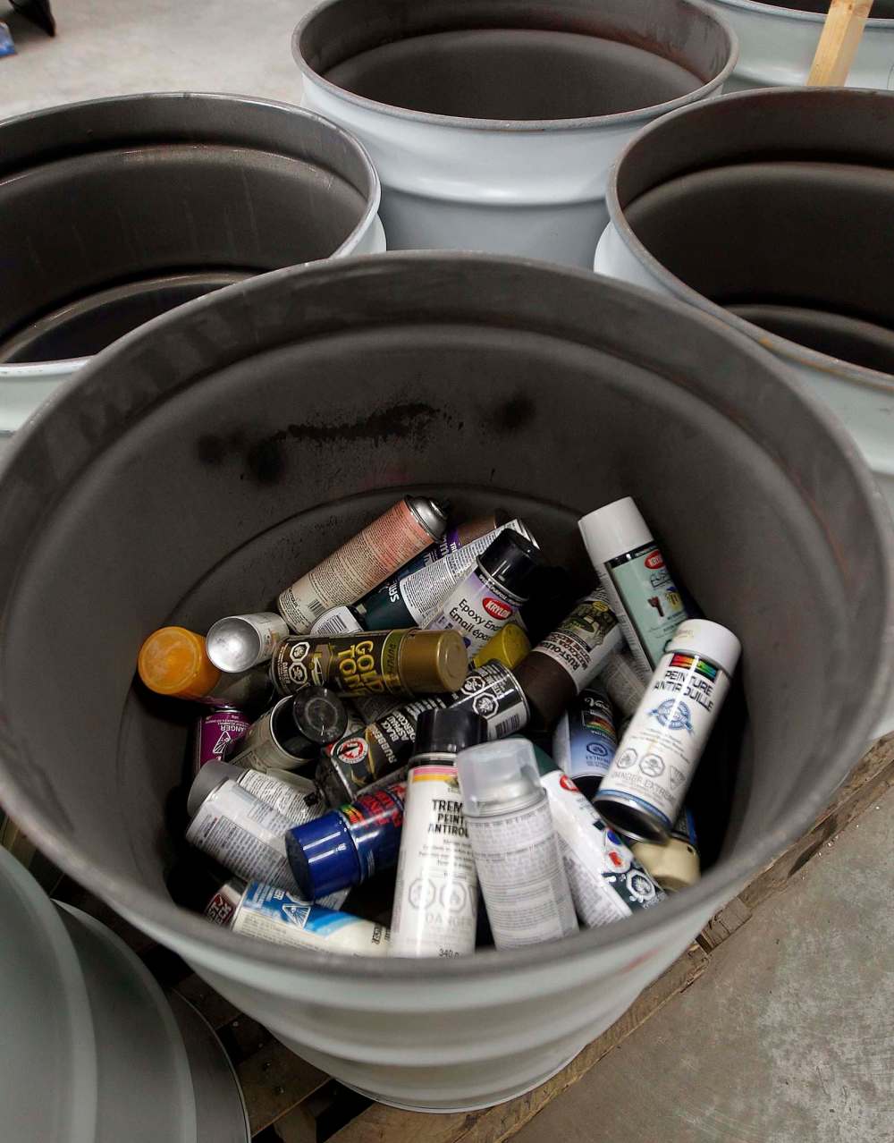PHIL HOSSACK / WINNIPEG FREE PRESS - Aerosol spray cans fill a barrel at the city's newest 4R Recycling Depot on Panet Road Thursday. See Jill Wilson's story. - August 15, 2018