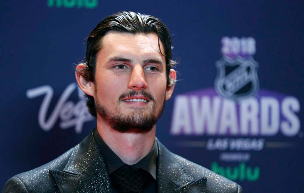 Last season, Connor Hellebuyck posted a record of 44 wins with a 2.36 GAA and a .924 save percentage and was nominated for the Vezina Trophy. If he can post similar numbers this year, the Jets have a chance at winning the Cup. (John Locher / The Associated Press files)