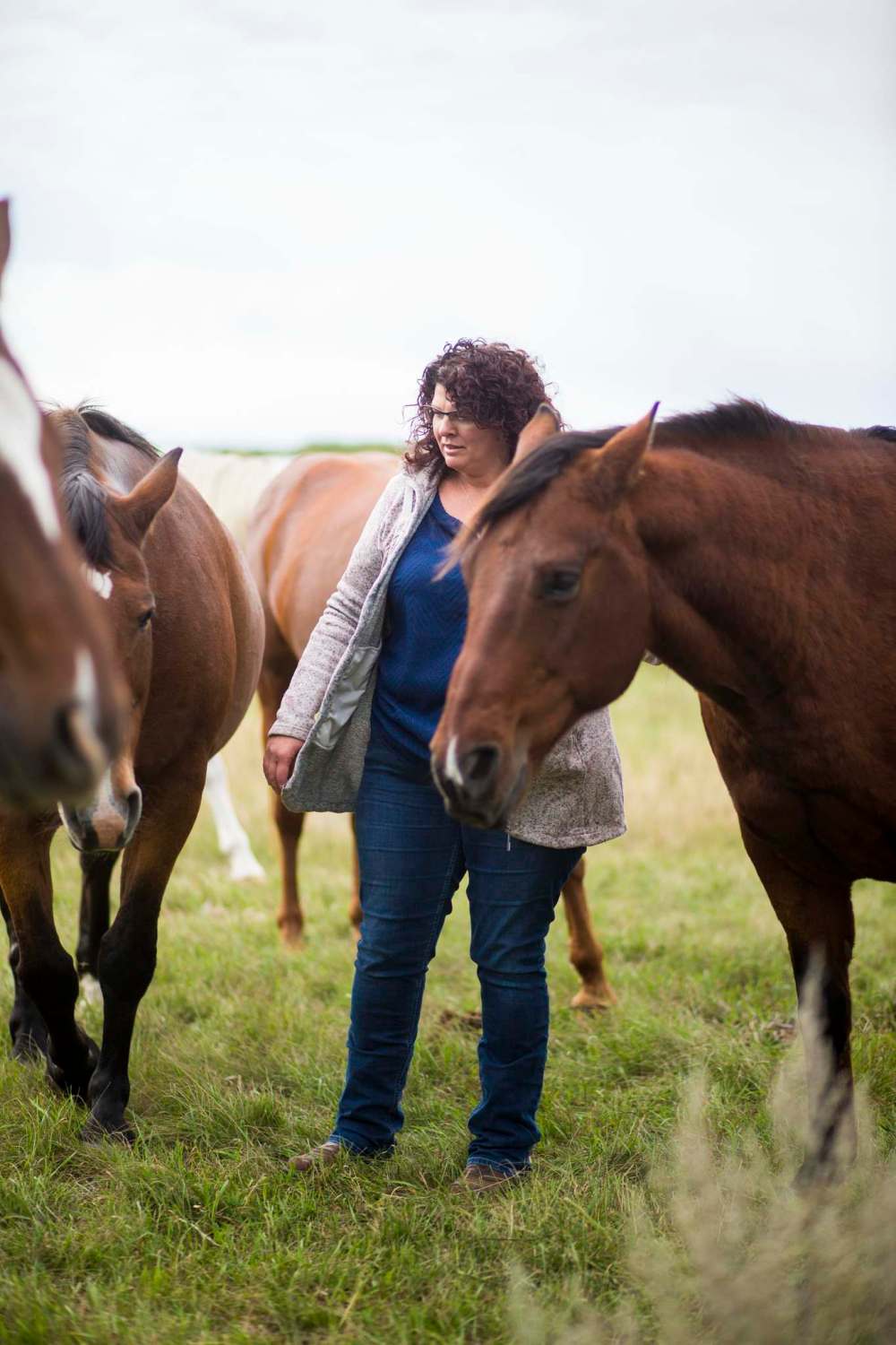 Tracy Wood with her horses at Farm Away, just outside of Portage la Prairie.
