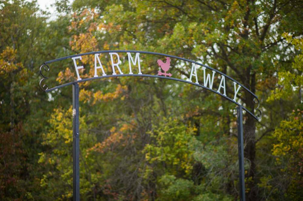 The sign welcomes guests to Farm Away.