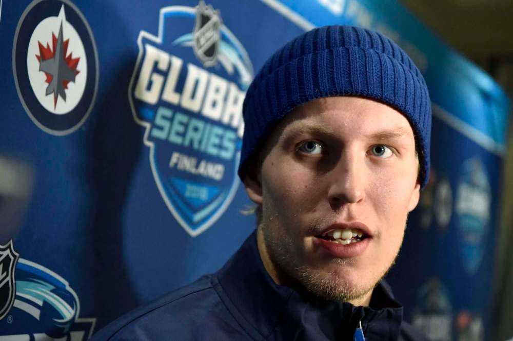 All eyes are on Patrik Laine as the Jets play in his home country this week. His demotion to the fourth line grabbed the attention of a hockey fans in Finland. (Jussi Nukari / Lehtikuva)