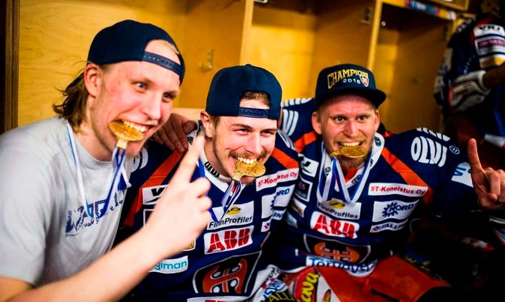 Patrik Laine (from left), Kristian Kuusela and Jani Lajunen after Tappara won the Finnish elite league title in 2016. (Supplied)