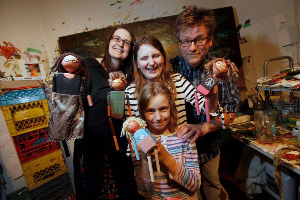 Gord and Megan Wilding with daughters Jasper Lily 12, and Laine 8, and their marionette avatars. The Wilding’s toy business, Wooden Squirrel at Work, has fielded orders from as far away as Germany and Japan. (Phil Hossack photos / Winnipeg Free Press)