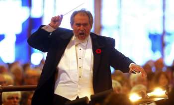 PHOTOS BY TREVOR HAGAN / WINNIPEG FREE PRESS
Conductor Yuri Klaz leads the Winnipeg Philharmonic Choir with the Winnipeg Symphony Orchestra during a concert at the St. Boniface Cathedral’s special 100 Years of Remembrance ceremony on Sunday.