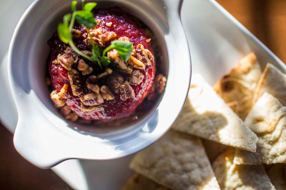 MIKAELA MACKENZIE / WINNIPEG FREE PRESS
Baked brie with a seasonal topping and pita.