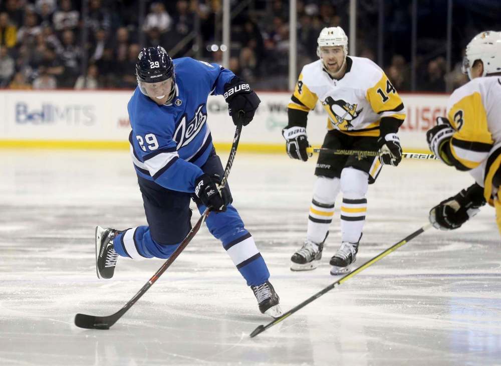 Pending restricted free agent Patrik Laine will be looking for a big-money deal next summer, which will challenge the GM to keep the team under the salary cap without gutting the roster. (Trevor Hagan / The Canadian Press files)