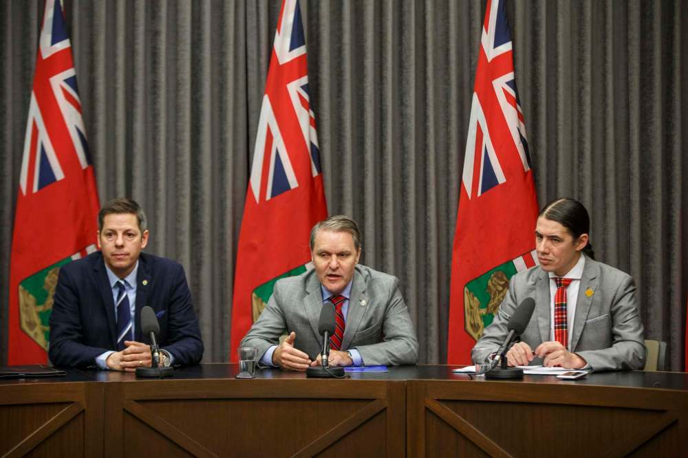 Winnipeg Mayor Brian Bowman (from left), Manitoba Health Minister Cameron Friesen and Winnipeg Centre MP Robert-Falcon Ouellette announced the formation Tuesday of a tri-level task force to deal with the province's meth crisis. (Mike Deal / Winnipeg Free Press)
