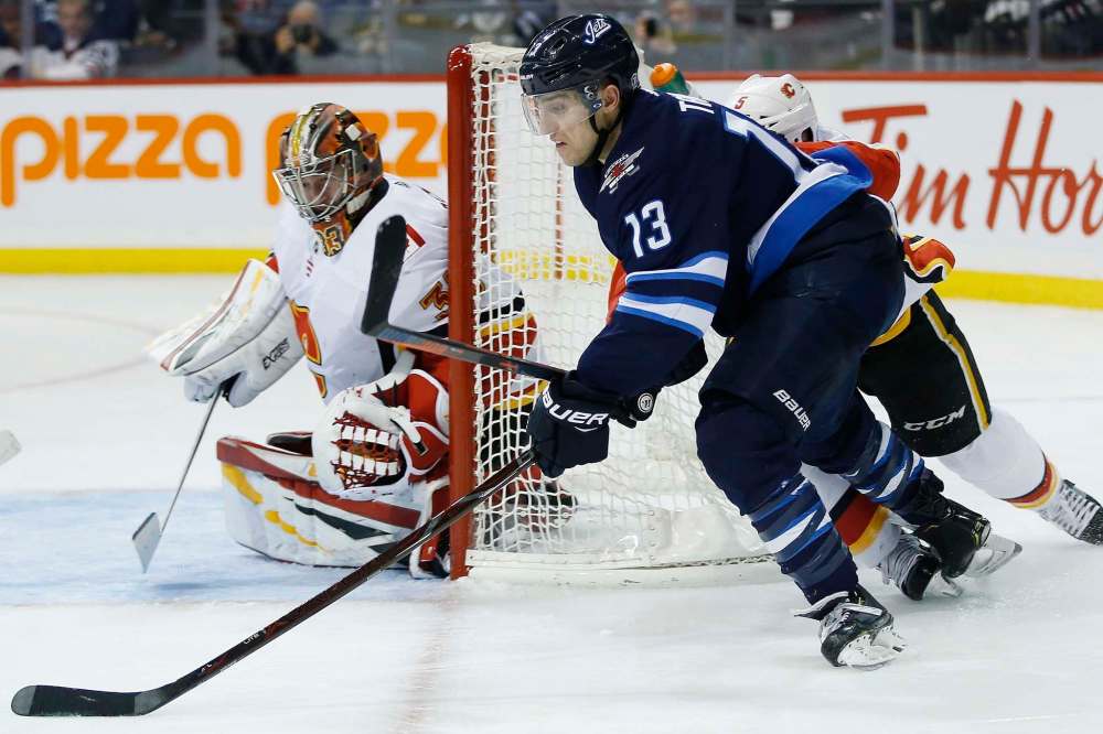 Tanev is ferocious on the forecheck, has speed to burn, is part of an above-average penalty killing unit and has a defence-first mentality. (John Woods/ The Canadian Press)