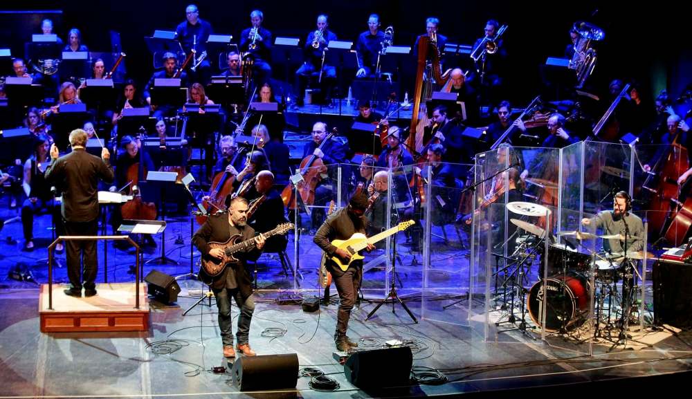 Javier Reyes (from left), Tosin Abasi and drummer Matt Garstka of Washington D.C. prog outfit Animals as Leaders made their symphonic debut Wednesday with the WSO. (Phil Hossack / Winnipeg Free Press)