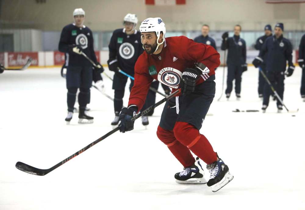 Dustin Byfuglien participated in a full practice with the Jets Monday at the IcePlex. (Ruth Bonneville / Winnipeg Free Press)