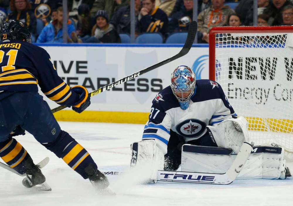 Connor Hellebuyck got back into his groove in Buffalo after being in net for back-to-back losing efforts against San Jose and Montreal. (Jeffrey T. Barnes / The Associated Press files)