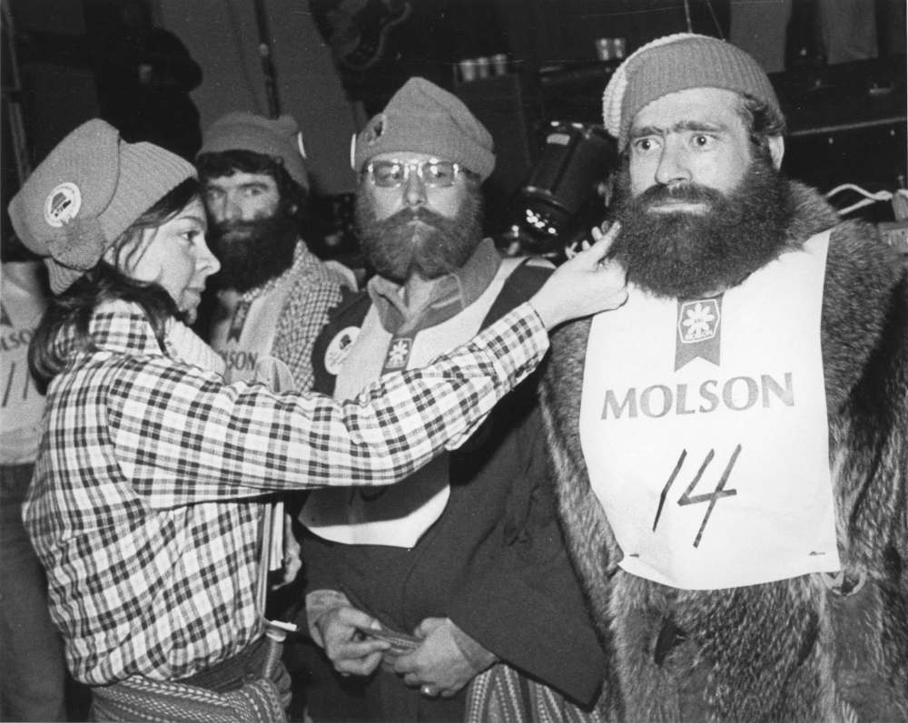 WAYNE GLOWACKI / WINNIPEG FREE PRESS FILES
Judge Christine Bergerson inspects Paul Conrad’s beard as George Einarson keeps his eye on the proceedings during the 1980 Festival. The men were contestants in one of Festival’s beard-growing contests, in the category of ‘beards started before Dec. 15, 1979.’