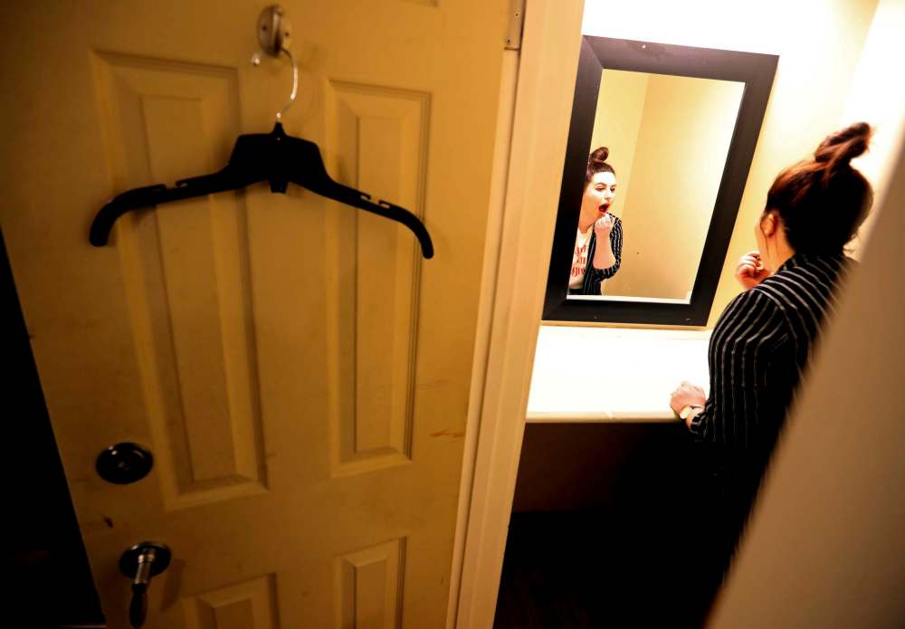 Jen Zoratti gets ready to take the stage. (Trevor Hagan / Winnipeg Free Press)