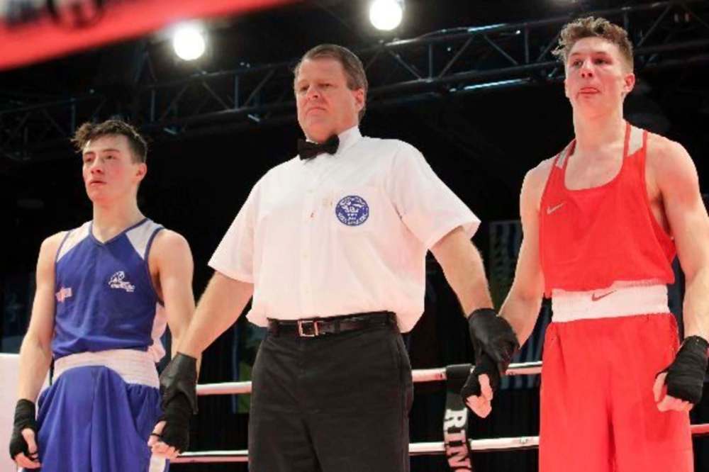 SPORT MANITOBA
Beausejour's Justice Harborne (in blue) will bring home a silver medal after a very close fight in the 60kg competition.