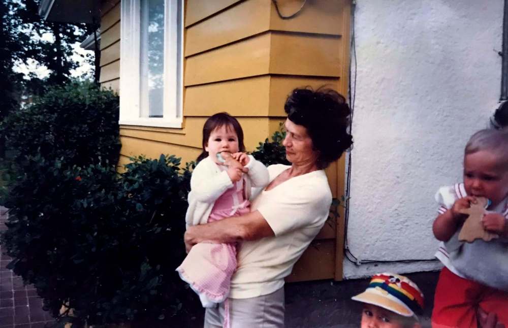 Olga Herdy holding great niece Julie Veenstra in 1986.