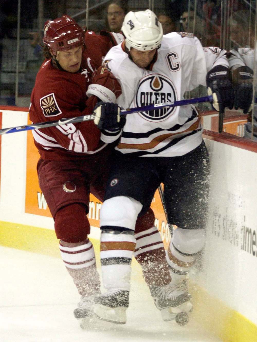 John Woods / The Canadian Press files
Edmonton Oilers Jason Smith (right) is checked by Doan.
