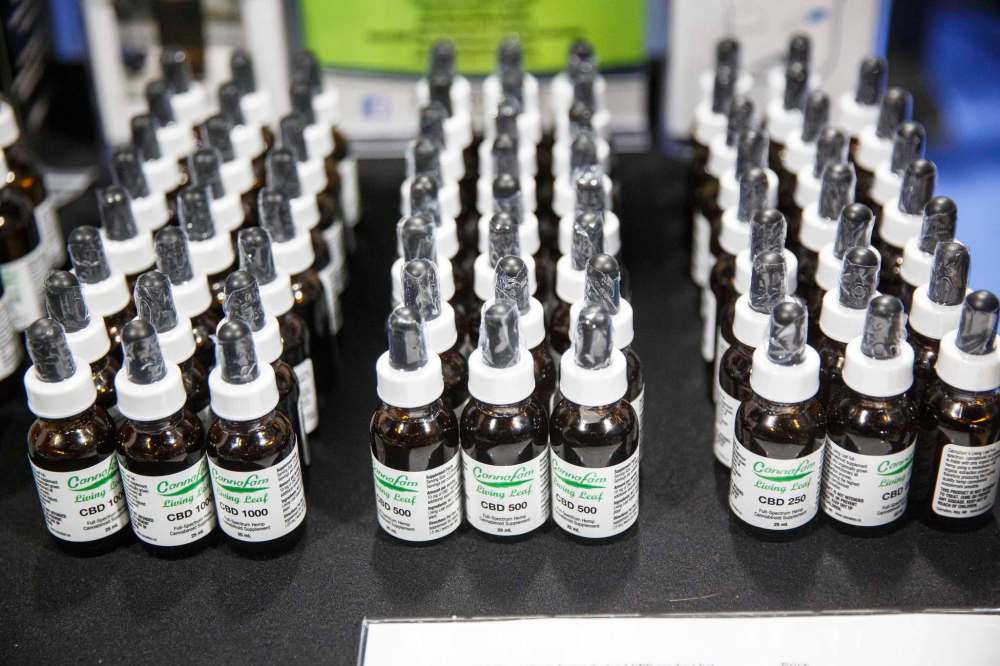 Unlicensed CBD products for sale at the HempFest Cannabis Expo included oils, topical creams, roll-on sticks, candies, teas and vape pens.