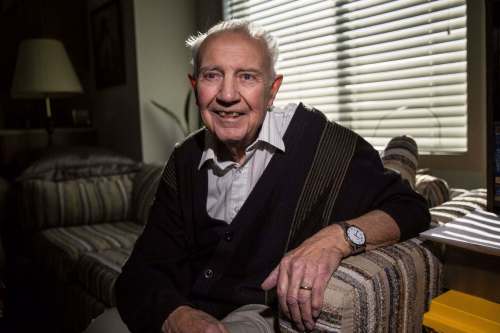John Junson, former federal forecaster, founder of WeatherTec Services and Free Press weather columnist, died Feb. 14 at the age of 95. His daughter, Janeen, says, 'It's appropriate he died on Valentine's Day, because everyone loved him. (Mike Deal / Winnipeg Free Press)