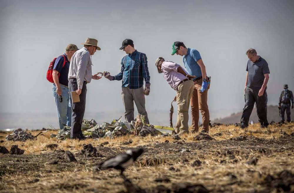 Ethiopian Airlines had issued no new updates on the crash as of late afternoon Tuesday as families around the world waited for answers, while a global team of investigators began picking through the rural crash site. (Mulugeta Ayene / The Associated Press)