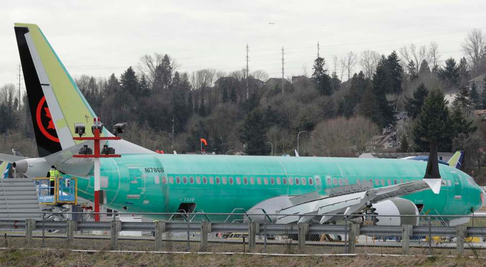 A Boeing 737 MAX 8 airplane being built for Air Canada sits parked at Boeing Co.'s Renton Assembly Plant in Renton, Wash. (Ted S. Warren / The Associated Press)