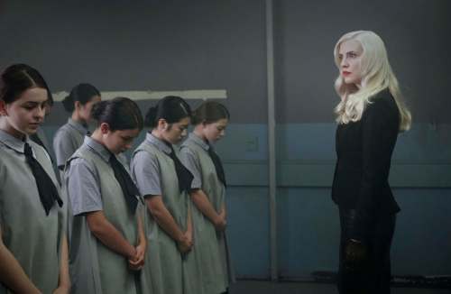 Level 16, written and directed by Danishka Esterhazy, stars Sara Canning (right) as headmistress of a grim girls' academy and was filmost entirely on a single interior set. (Raven Banner photos)