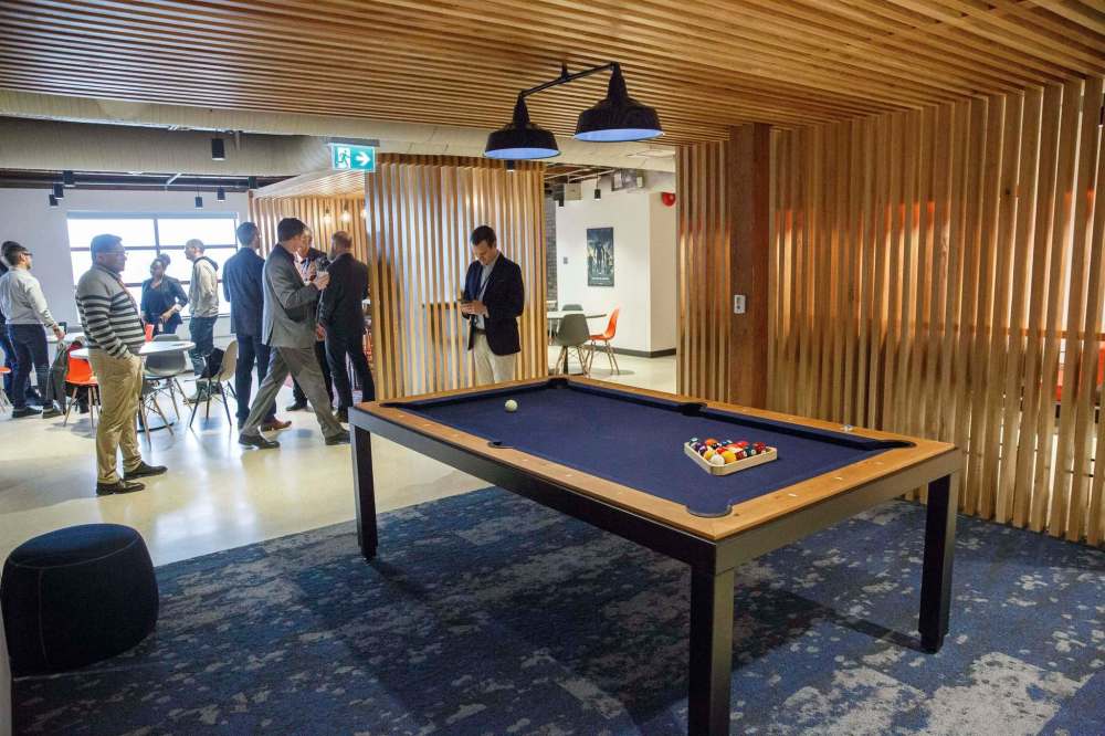 MIKE DEAL / WINNIPEG FREE PRESS  
The common room area of the office includes a pool table and small kitchen.
