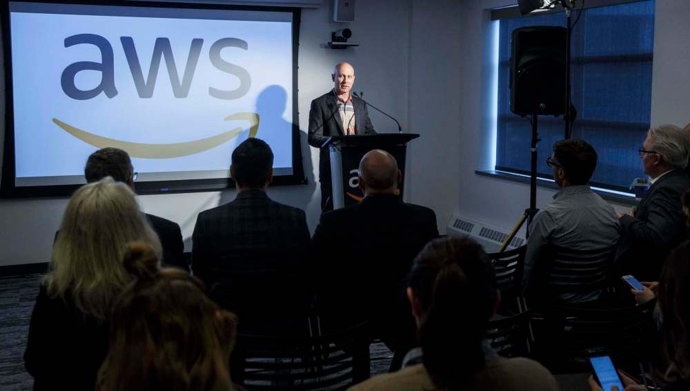 MIKE DEAL / WINNIPEG FREE PRESS 
Joshua Burgin, general manager at Amazon Web Services, speaks during the official opening.