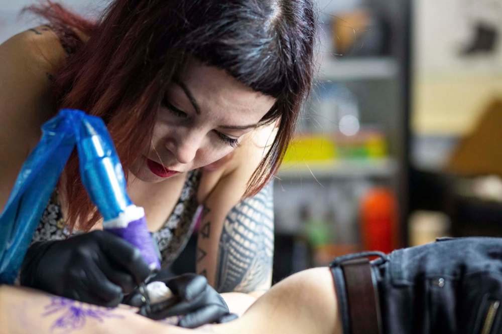 MIKAELA MACKENZIE / WINNIPEG FREE PRESS Rhind won't give teenagers tattoos of band logos.